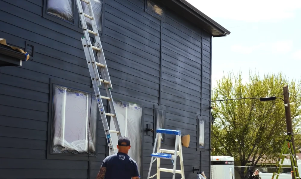 Freshly painted fiber cement siding, even color across the wall