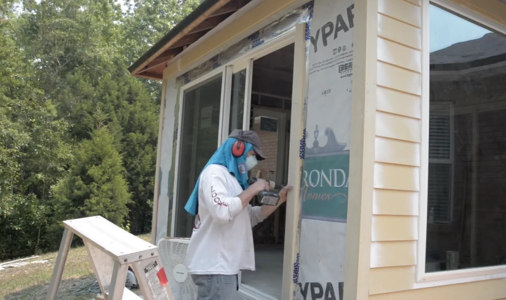 Siding installation crew at work