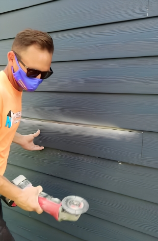 Installation crew working on James Hardie siding